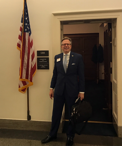 founder walking out of a government office